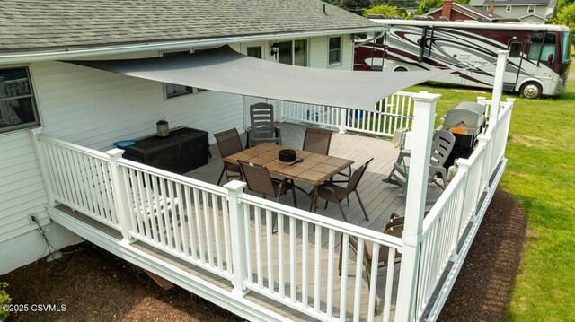 306 Clybourne Ave, Berwick, PA 18603 - wooden terrace with outdoor dining area, a lawn, and area for grilling
