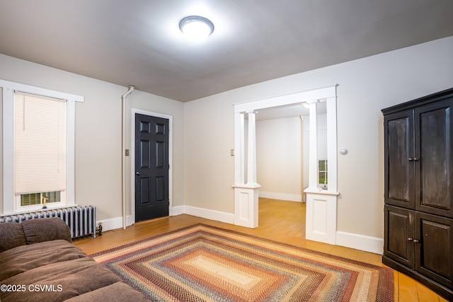 637 Pfahler St, Catawissa, PA 17820 - living area with radiator heating unit and wood finished floors
