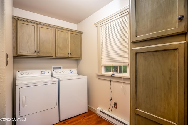 637 Pfahler St, Catawissa, PA 17820 - laundry area with a baseboard heating unit, cabinet space, independent washer and dryer, and dark wood-style floors