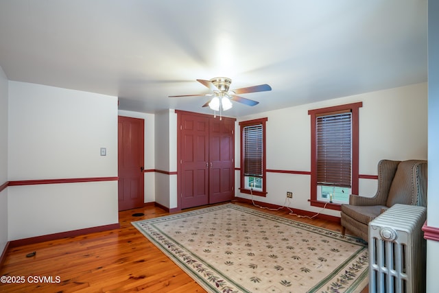 637 Pfahler St, Catawissa, PA 17820 - entryway featuring radiator heating unit, a ceiling fan, and light wood-style floors