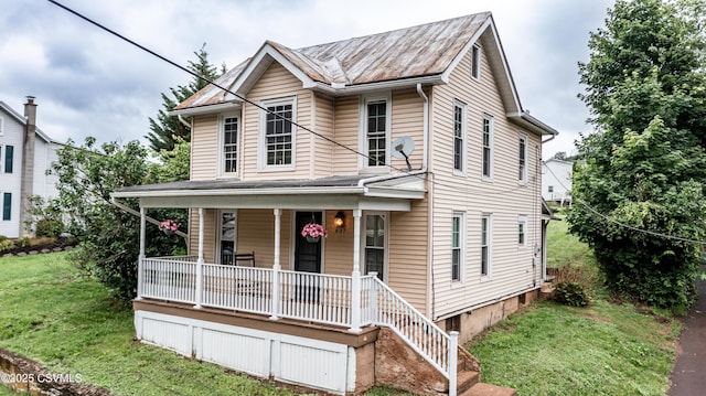 637 Pfahler St, Catawissa, PA 17820 - traditional-style home featuring covered porch and a front lawn