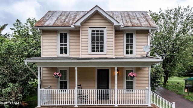 637 Pfahler St, Catawissa, PA 17820 - view of front facade with a porch, a standing seam roof, and a metal roof