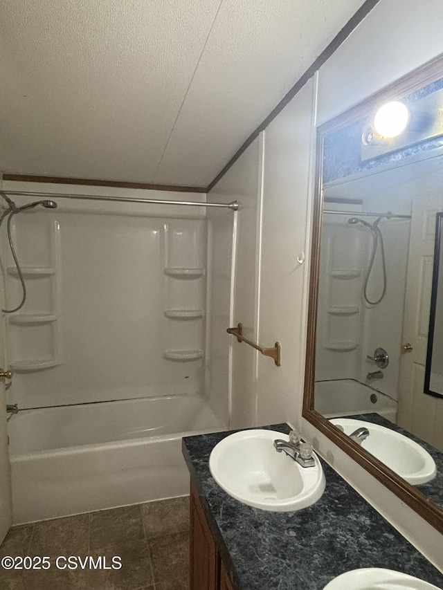 1311 Water St, Northumberland, PA 17857 - bathroom featuring double vanity, bathtub / shower combination, and a textured ceiling