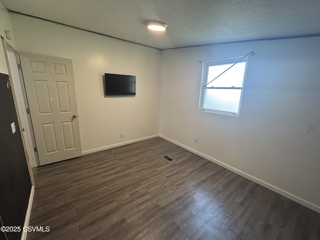 1311 Water St, Northumberland, PA 17857 - spare room with dark wood finished floors and a textured ceiling