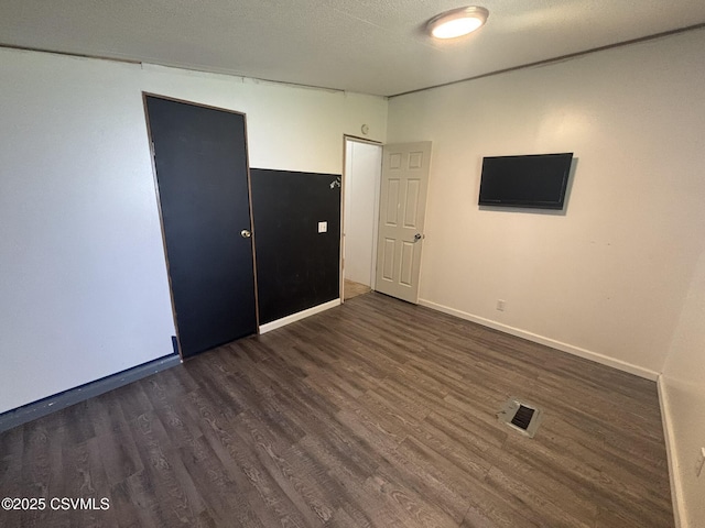 1311 Water St, Northumberland, PA 17857 - spare room featuring dark wood-type flooring