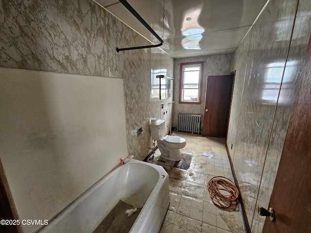 334 W Butternut St, Mount Carmel, PA 17851 - full bathroom with radiator heating unit, a bath, toilet, and a bidet