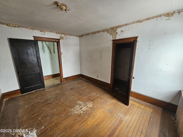 334 W Butternut St, Mount Carmel, PA 17851 - unfurnished room featuring hardwood / wood-style flooring and baseboards