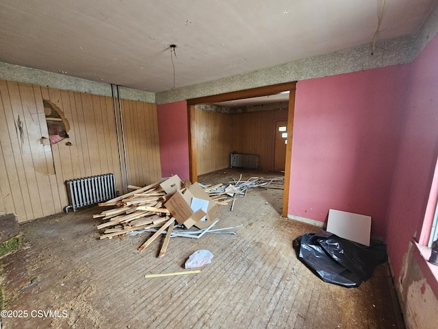 334 W Butternut St, Mount Carmel, PA 17851 - empty room with radiator and wood walls