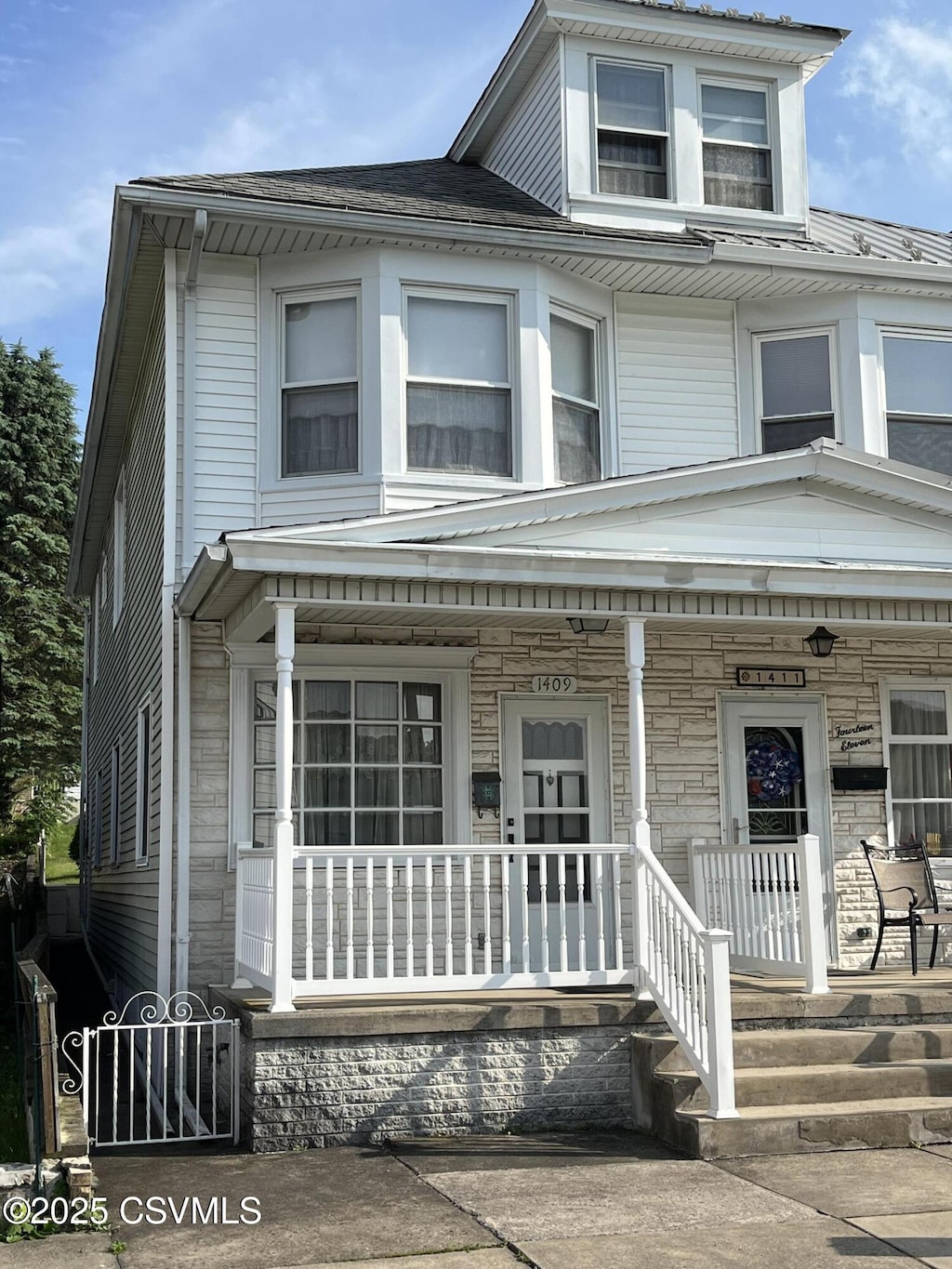 1409 Scott St, Kulpmont, PA 17834 - traditional style home with a porch and stone siding