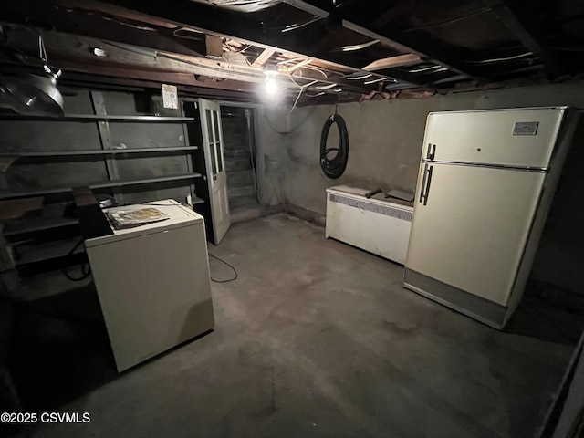 1409 Scott St, Kulpmont, PA 17834 - unfinished below grade area with freestanding refrigerator and washer / dryer