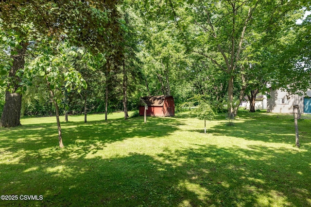 110 W 8th St, Watsontown, PA 17777 - view of green lawn featuring a storage shed