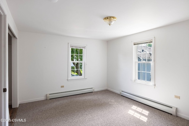 110 W 8th St, Watsontown, PA 17777 - unfurnished bedroom with baseboard heating and carpet