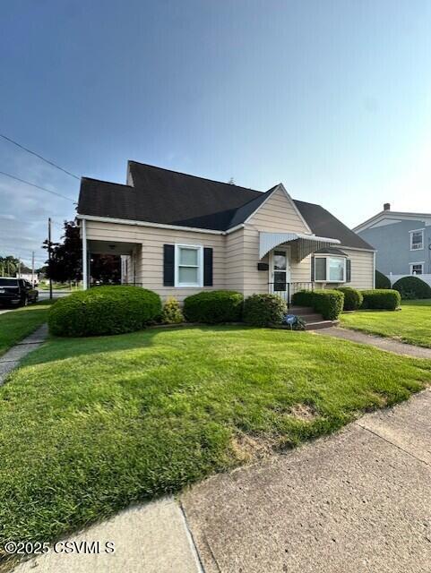 1030 Orange St, Berwick, PA 18603 - view of front of house featuring a front lawn