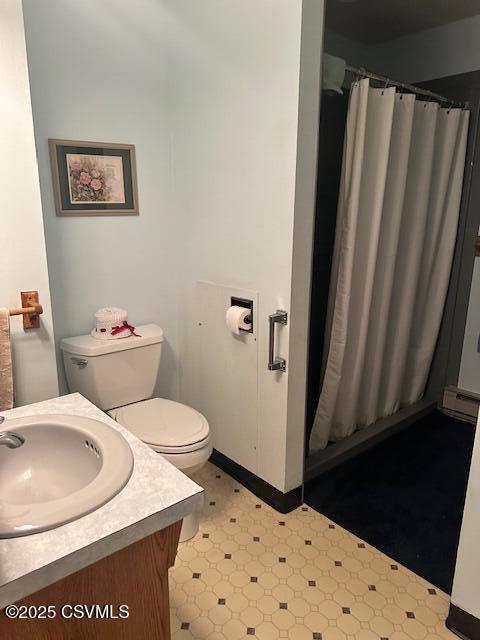 1030 Orange St, Berwick, PA 18603 - bathroom featuring vanity, tile patterned floors, and a shower with shower curtain