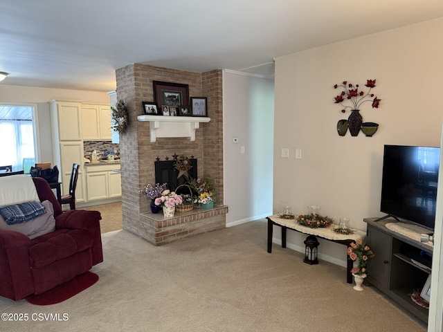 128 Woodside Rd, Sunbury, PA 17801 - living area featuring light colored carpet and a fireplace