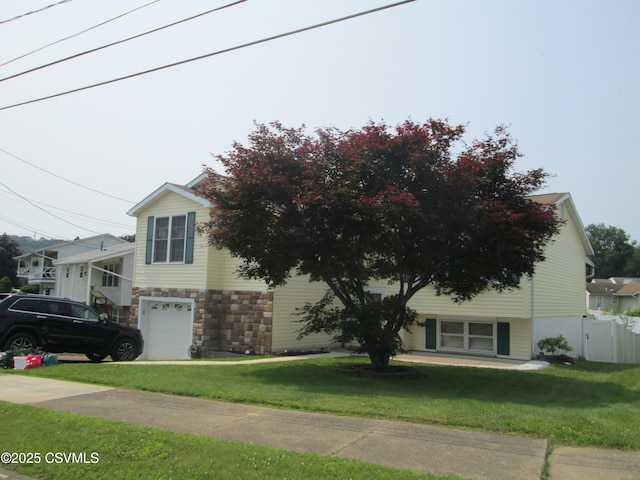 223 Maple Rd, Berwick, PA 18603 - view of front of house with stone siding and a garage