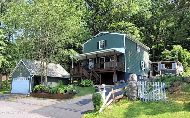 124 E Coal St, Trevorton, PA 17881 - view of front of property featuring covered porch, an outbuilding, and stairs