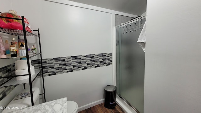 124 E Coal St, Trevorton, PA 17881 - bathroom featuring a shower stall, wood finished floors, and backsplash