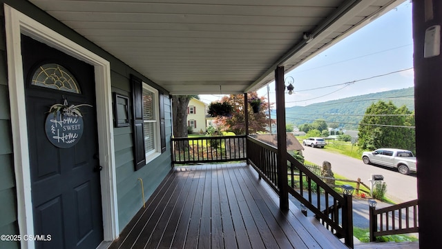 124 E Coal St, Trevorton, PA 17881 - wooden porch with a mountain view