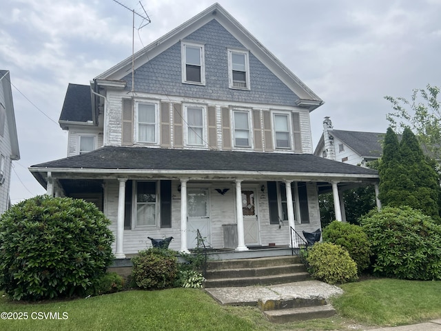 612-614 1st St, Nescopeck, PA 18635 - victorian-style house featuring covered porch and a front yard