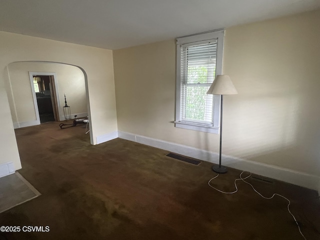 612-614 1st St, Nescopeck, PA 18635 - unfurnished room featuring dark carpet and arched walkways