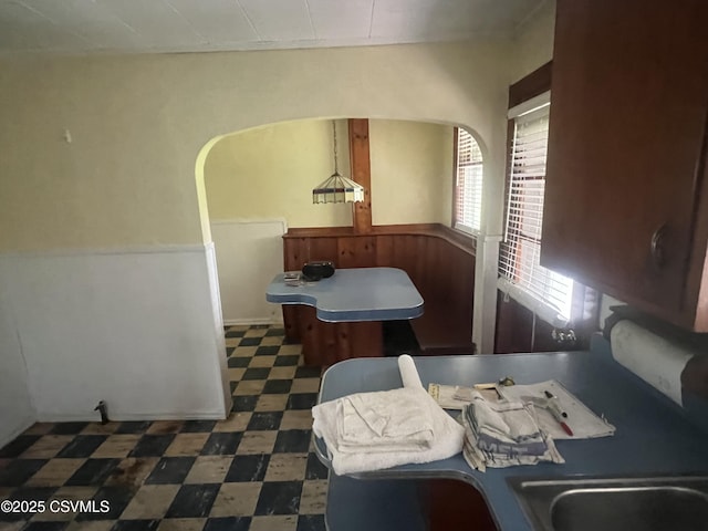 612-614 1st St, Nescopeck, PA 18635 - dining space featuring tile patterned floors and wainscoting