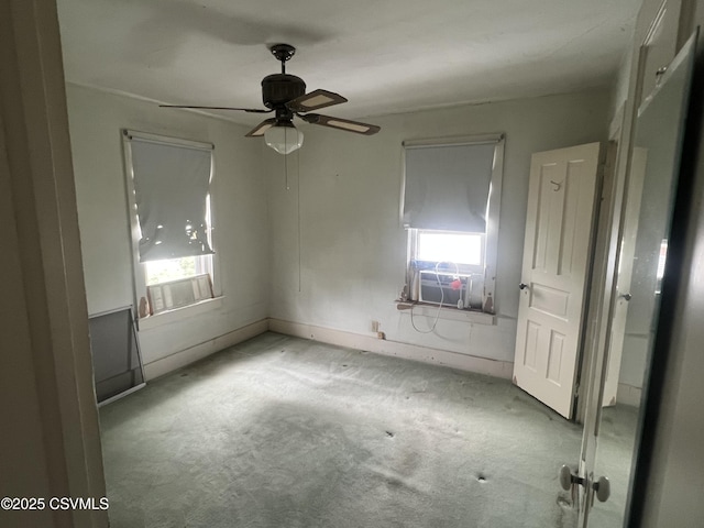 612-614 1st St, Nescopeck, PA 18635 - unfurnished bedroom with multiple windows, carpet, and a ceiling fan