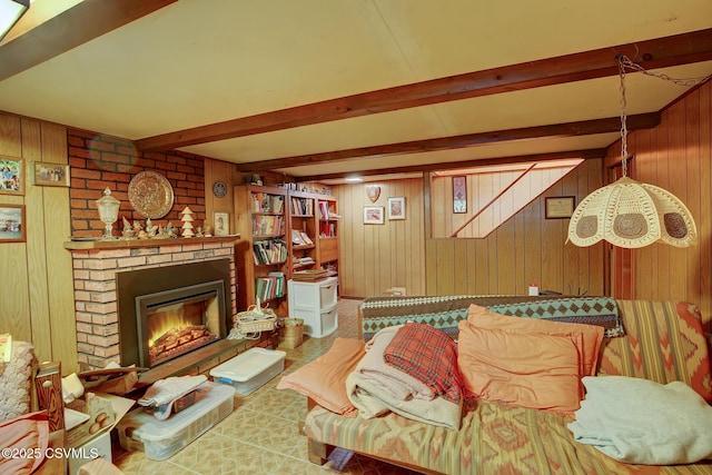 7 N Red Maple St, Selinsgrove, PA 17870 - living room featuring wood walls, beamed ceiling, and a fireplace