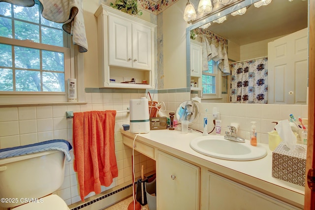 7 N Red Maple St, Selinsgrove, PA 17870 - full bath with tile walls, vanity, a baseboard heating unit, and a shower with curtain