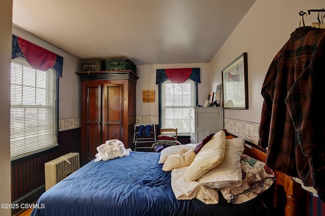 7 N Red Maple St, Selinsgrove, PA 17870 - bedroom featuring multiple windows, wood finished floors, and a wainscoted wall