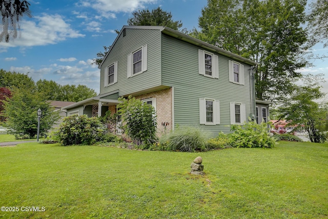 7 N Red Maple St, Selinsgrove, PA 17870 - view of side of home with brick siding and a yard