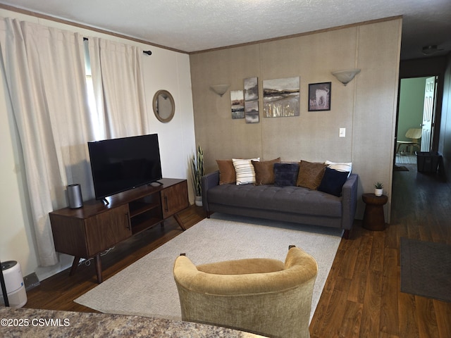 94 Porter Gray Rdg, Bloomsburg, PA 17815 - living area featuring wood finished floors, crown molding, and a textured ceiling