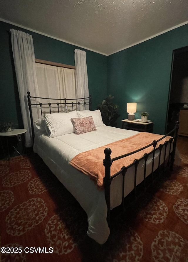 94 Porter Gray Rdg, Bloomsburg, PA 17815 - bedroom featuring wood finished floors, crown molding, and a textured ceiling