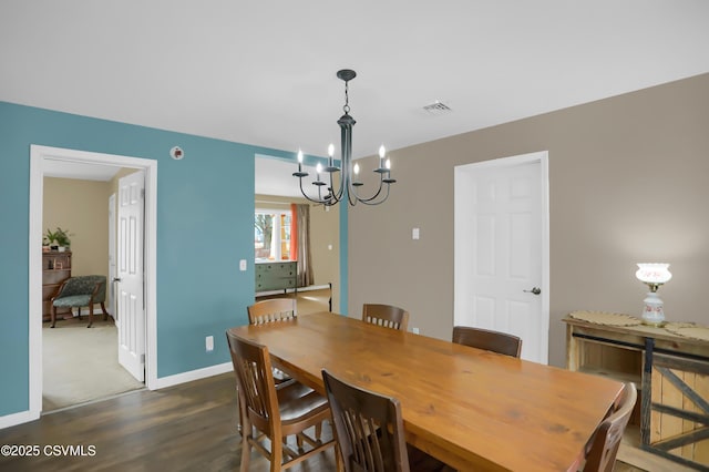 152 Bridge Ave, Allenwood, PA 17810 - dining room with dark wood finished floors and a chandelier