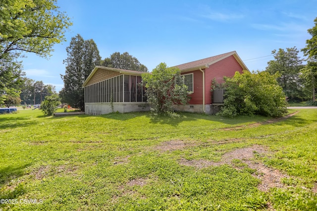 152 Bridge Ave, Allenwood, PA 17810 - view of side of home featuring crawl space, a sunroom, and a lawn