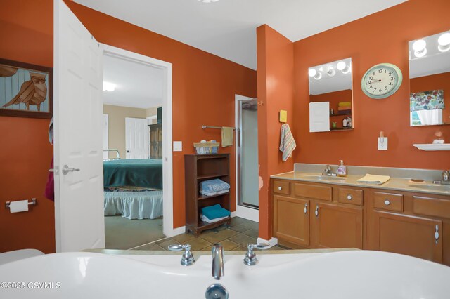 152 Bridge Ave, Allenwood, PA 17810 - ensuite bathroom featuring double vanity, tile patterned flooring, and a stall shower