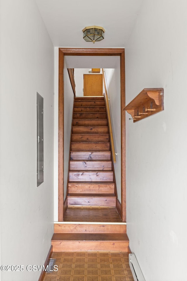 109 W Ninth St, Watsontown, PA 17777 - staircase featuring tile patterned floors and baseboards