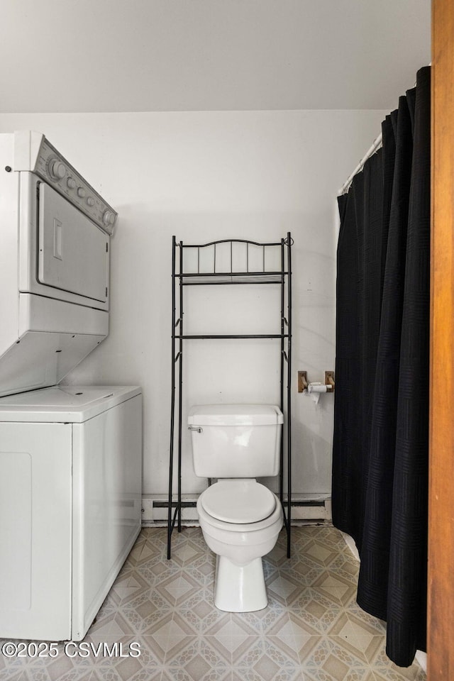 109 W Ninth St, Watsontown, PA 17777 - full bathroom featuring stacked washer and clothes dryer, baseboard heating, and tile patterned flooring