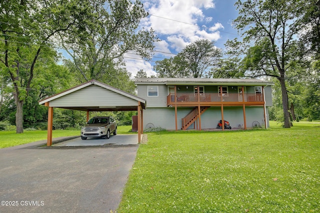 108 Creek Rd, Selinsgrove, PA 17870 - view of front of property featuring a detached carport, stairs, and a front yard