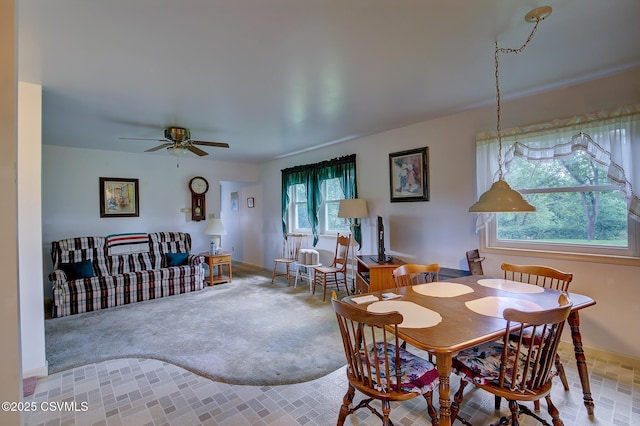 108 Creek Rd, Selinsgrove, PA 17870 - carpeted dining room with a ceiling fan and baseboards