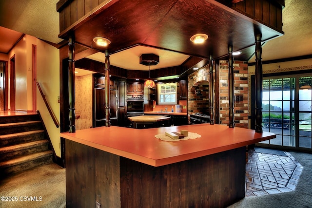 157 Distillery Hill Rd, Benton, PA 17814 - kitchen with carpet floors, a large island, paneled fridge, light countertops, and a textured ceiling
