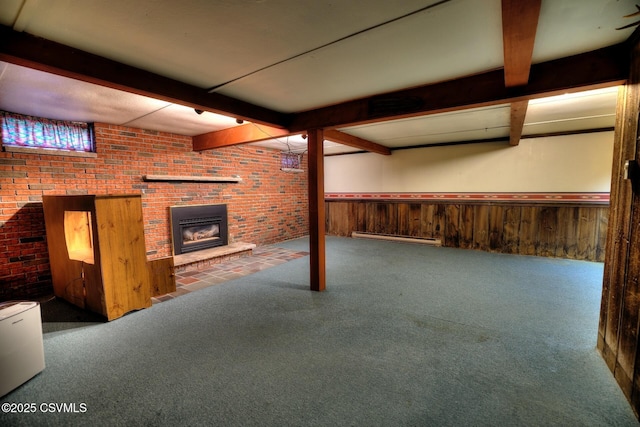 157 Distillery Hill Rd, Benton, PA 17814 - finished basement featuring a baseboard heating unit, carpet flooring, a wainscoted wall, wooden walls, and a brick fireplace