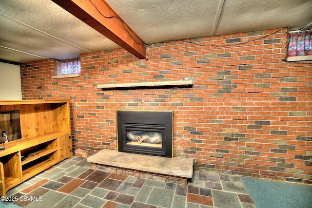 157 Distillery Hill Rd, Benton, PA 17814 - detailed view of a textured ceiling, brick wall, and a glass covered fireplace
