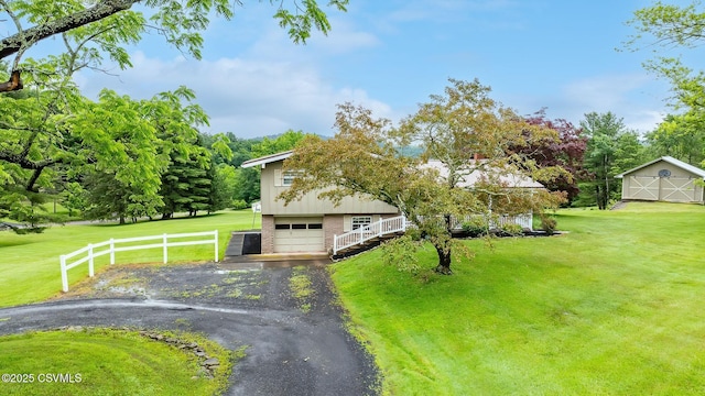 157 Distillery Hill Rd, Benton, PA 17814 - view of front of house with asphalt driveway, brick siding, and an attached garage
