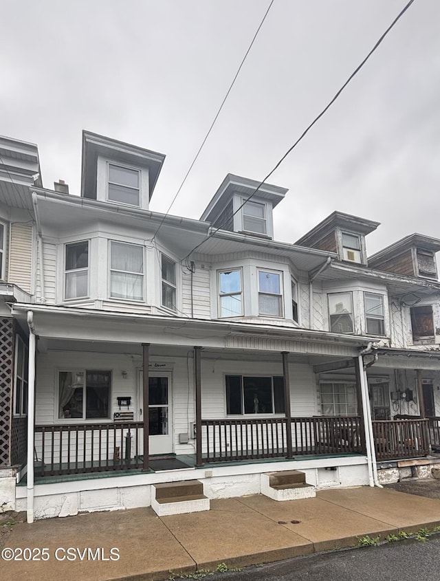 1211 W Mulberry St, Coal Township, PA 17866 - townhome / multi-family property featuring a porch
