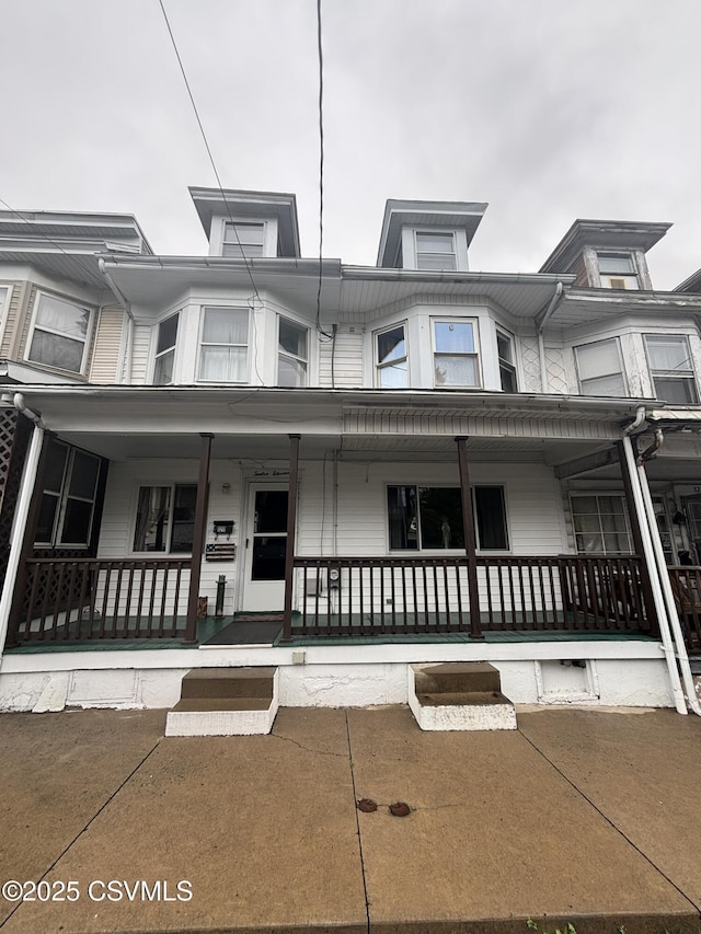 1211 W Mulberry St, Coal Township, PA 17866 - townhome / multi-family property with covered porch