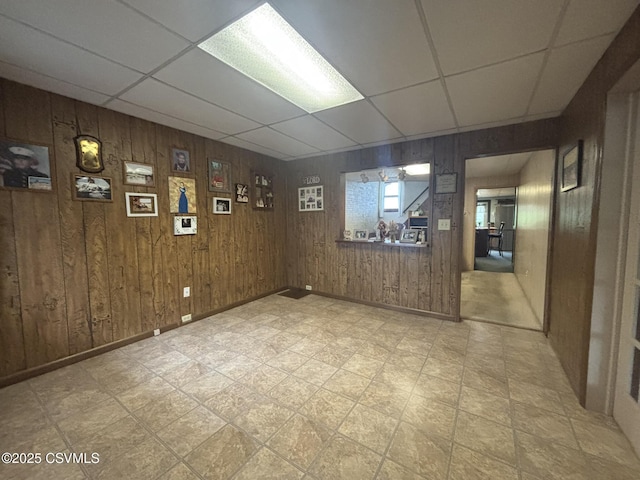 1211 W Mulberry St, Coal Township, PA 17866 - basement with a drop ceiling, wooden walls, and light floors