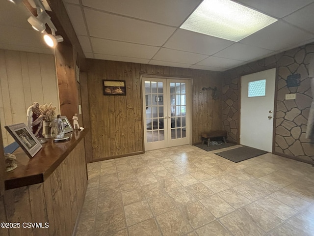1211 W Mulberry St, Coal Township, PA 17866 - entryway featuring wood walls, a paneled ceiling, french doors, and healthy amount of natural light