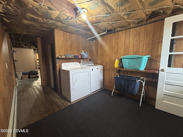 1211 W Mulberry St, Coal Township, PA 17866 - laundry area featuring wood walls, washer and clothes dryer, and dark wood-style flooring