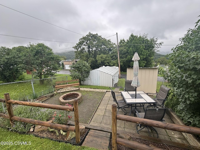 1211 W Mulberry St, Coal Township, PA 17866 - view of patio with outdoor dining space and an outdoor structure
